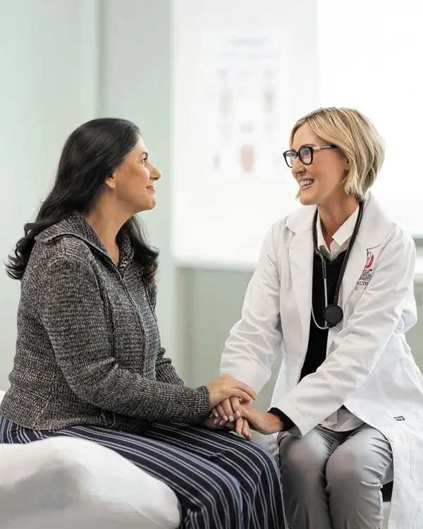 A doctor and a patient sitting down to talk.
