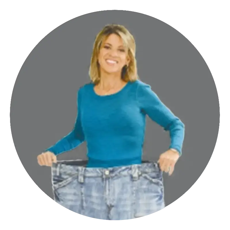 A photo of Ally, standing inside her jeans, showing how much weight she lost